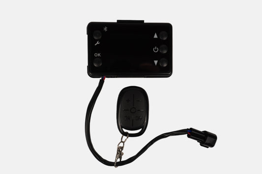 Black remote control device with keychain on a white background